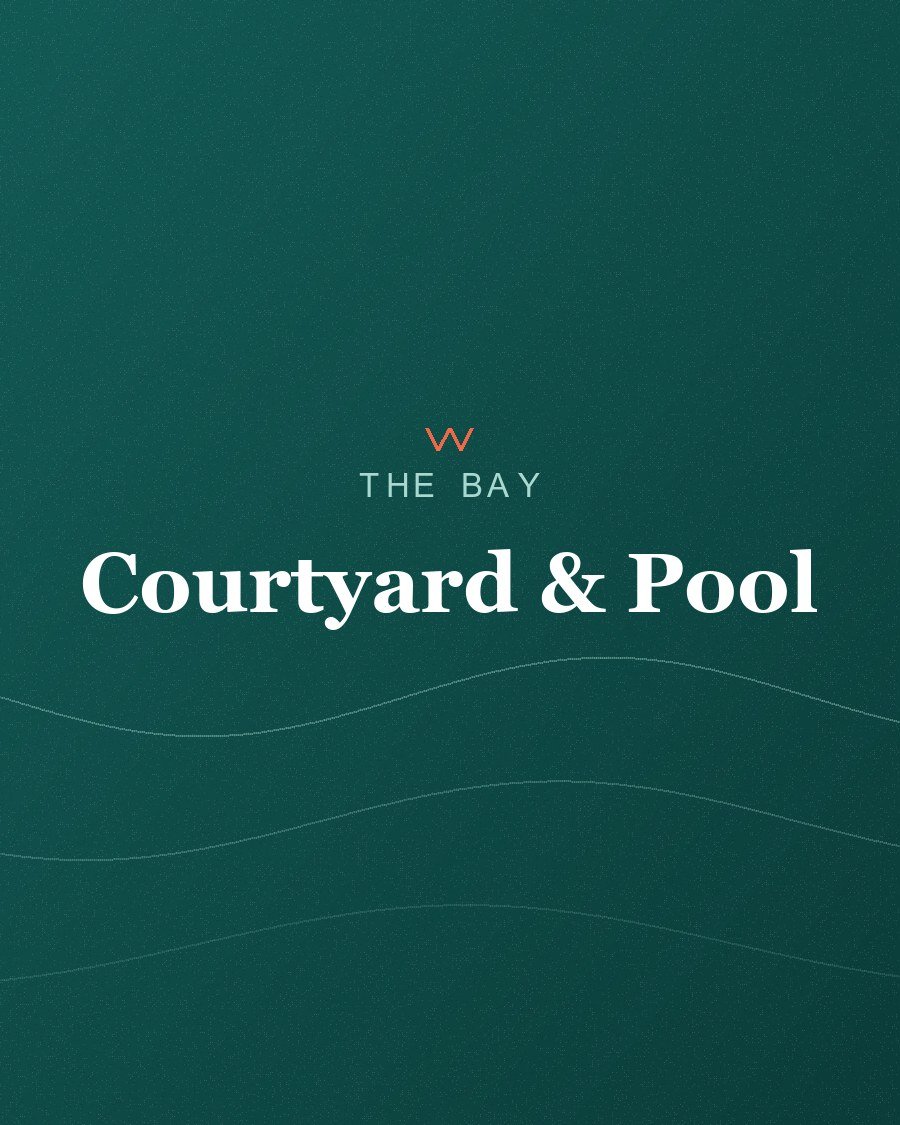 The garden courtyard and pool at The Bay